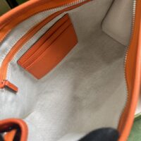 Gucci Unisex Jumbo GG Pouch Orange Jumbo GG Leather Moiré Lining (1)