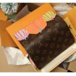 Louis Vuitton Unisex LV x YK Sarah Wallet Monogram Coated Canvas Pumpkin Print - Imagen 7