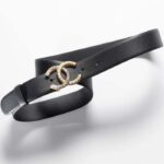 Ceinture Chanel CC pour femme en cuir de veau doré, métal, résine et strass noirs