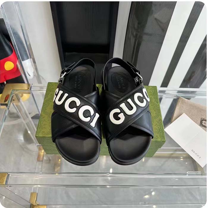 Gucci Unisex GG Gucci Sandal Smooth Black White Leather Script Rubber Buckle Flat (9)