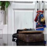 Louis Vuitton LV Unisex S-Lock Vertical Wearable Wallet Radiant Sun Monogram Macassar Coated Canvas - Image 5