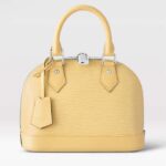 Bolso de mano Louis Vuitton LV para mujer Alma BB en piel de vacuno granulada Epi amarilla Jaune Plume