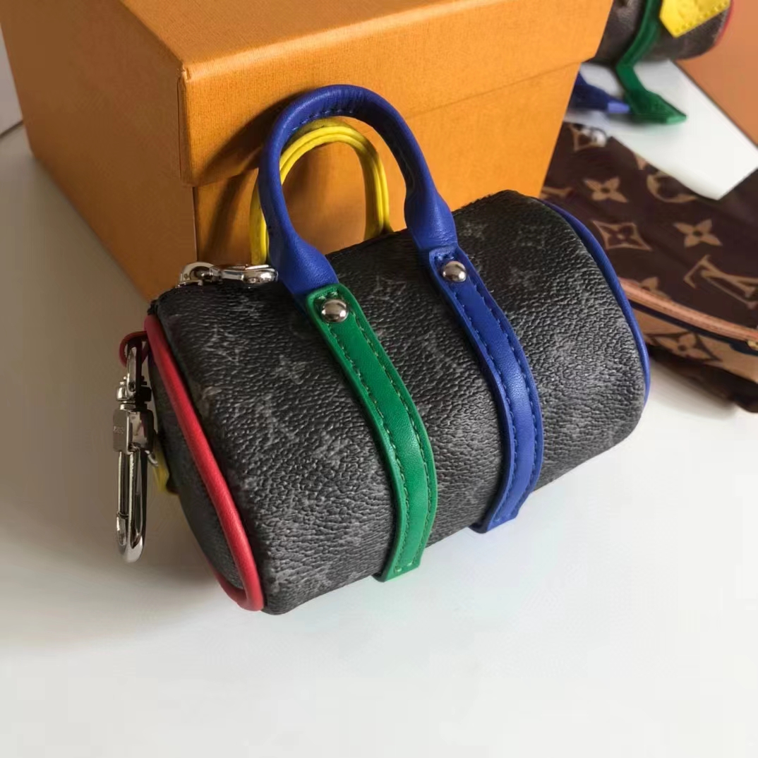 Louis Vuitton Unisex LV Mister Keepall Key Holder Bag Charm Monogram Eclipse Coated Canvas Leather (1)