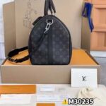 Louis Vuitton LV Unisex Keepall 50 Bandoulière Black Cabin-Size Taiga Cowhide Leather Monogram Eclipse Coated Canvas - Image 5