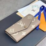 Louis Vuitton LV Unisex Sarah Wallet Cream Monogram Empreinte Embossed Supple Grained Cowhide Leather - Image 3