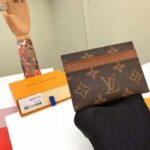 Louis Vuitton LV Unisex Double Card Holder Radiant Sun Monogram Macassar Coated Canvas – Image 2