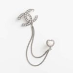 Broche Chanel para mujer en metal y strass