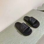 Gucci Unisex GG Interlocking G Slide Sandal Black Textured Rubber - Imagen 4