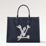 Louis Vuitton Unisex LV OnTheGo MM Svart Kornat Kalvskinn Hyskstängning