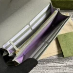 Portafoglio Continental unisex Gucci con scritta Gucci 7726380OP0N1440