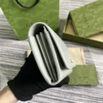 Portafoglio Continental unisex Gucci con scritta Gucci 7726380OP0N1440