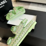 Sandali Chanel da donna in tessuto intrecciato verde tacco 1 cm