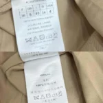 Jupe mi-longue plissée Dior Femme en gabardine de coton beige et noire à motif Paris allover