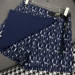 Skort aus weißem technischem Taft-Jacquard mit marineblauem Miss Dior Allover-Motiv