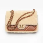 Borsa a patta da donna Chanel in pelle di agnello e montone, metallo color oro