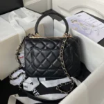 Chanel Damen Mini Flap Bag mit Tragegriff oben aus Lammleder - Schwarz