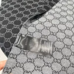 Écharpe unisexe Gucci en laine et soie jacquard GG - Noir