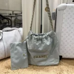 Chanel Women CC Small 22 Handbag Shiny Calfskin & Gold-Tone Metal-Light Blue