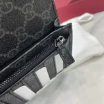Gucci Unisex GG Emblem Bi Fold Embossed Card Case-Black 818953AAEQ81000