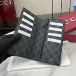 Gucci Unisex GG Emblem Bi Fold Embossed Card Case-Black 818953AAEQ81000