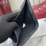 Gucci Unisex GG Emblem Bi Fold Embossed Wallet-Black