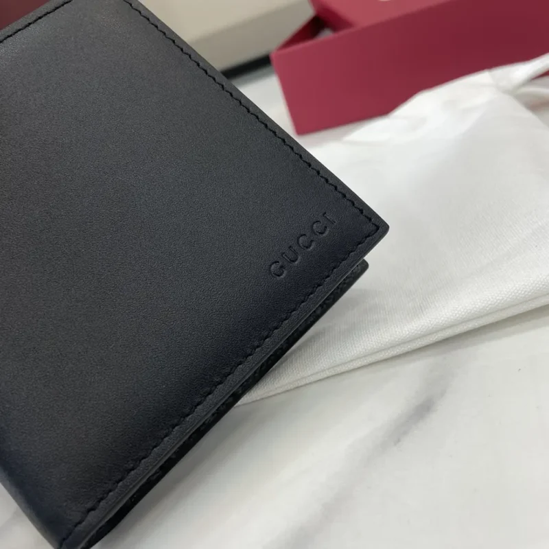 Gucci Unisex GG Emblem Bi Fold Embossed Wallet-Black