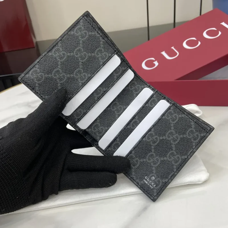 Gucci Unisex GG Emblem Bi Fold Embossed Wallet-Black