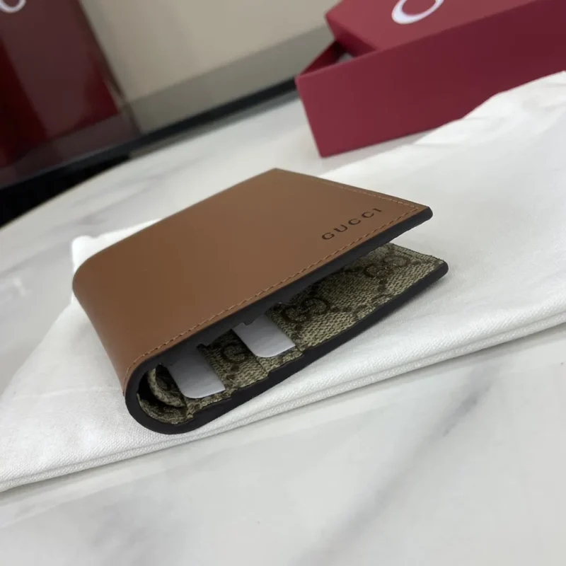 Gucci Unisex GG Emblem Bi Fold Embossed Wallet-Brown