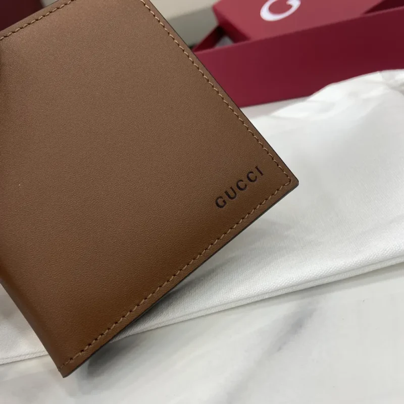 Gucci Unisex GG Emblem Bi Fold Embossed Wallet-Brown