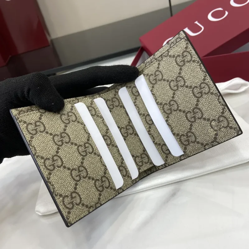 Gucci Unisex GG Emblem Bi Fold Embossed Wallet-Brown