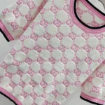 Haut ras du cou en coton Gucci pour femme avec motif GG intarsia 788766XKD1R9487