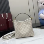 Gucci Women GG Emblem Small Shoulder Bag 815103FAD6L9641