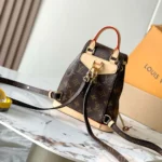 Louis Vuitton LV Women Montsouris Mini in Natural cowhide-leather Trim M11199