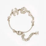 Bracciale Chanel da donna in metallo, perle di vetro e strass ABF382