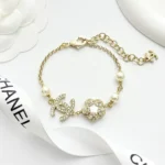Bracciale Chanel da donna in metallo, perle di vetro e strass ABF382