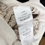 Dior utsvängda jeans för kvinnor i ecru bomullsdenim med Dior Oblique-inredning