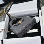 Chanel CC Mini Kelly Shopping Bag aus glänzendem, gealtertem Kalbsleder – Grau