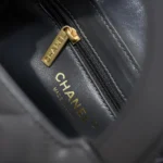 Chanel CC Mini Kelly Shopping Bag aus glänzendem, gealtertem Kalbsleder – Grau