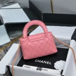 Chanel CC Mini Kelly Shopping Bag aus glänzendem, gealtertem Kalbsleder in Pink