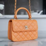 Borsa Chanel da donna con patta e manico superiore in pelle di agnello - Arancione