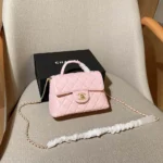 Chanel Women Small Flap Bag with Top Handle Lambskin Gold Tone Metal-Light Pink