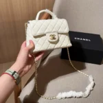 Chanel Women Small Flap Bag with Top Handle Lambskin Gold Tone Metal-White