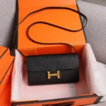 Hermes Women Constance Long To Go in Epsom Leather-Black/Gold