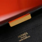 Hermes Women Constance Long To Go in Epsom Leather-Black/Gold