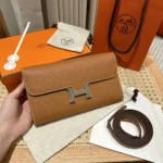 Hermes Women Constance Long To Go in Epsom Leather-Brown/Silver