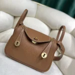 Hermes Women Lindy Mini 19 in Clemence Leather-BrownHermes Women Lindy Mini 19 in Clemence Leather-Brown