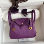 Hermes Lindy Mini 19 Damväska i Clemence Läder-Lila/Guld