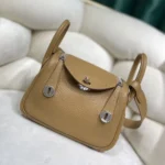 Hermes Women Lindy Mini 19 in Clemence Leather-Sandy