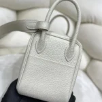 Hermes Women Lindy Mini 19 in Clemence Leather-White/Gold