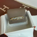 Hermes Women Roulis Mini Bag in Evergrain Calfskin-Gray/Gold